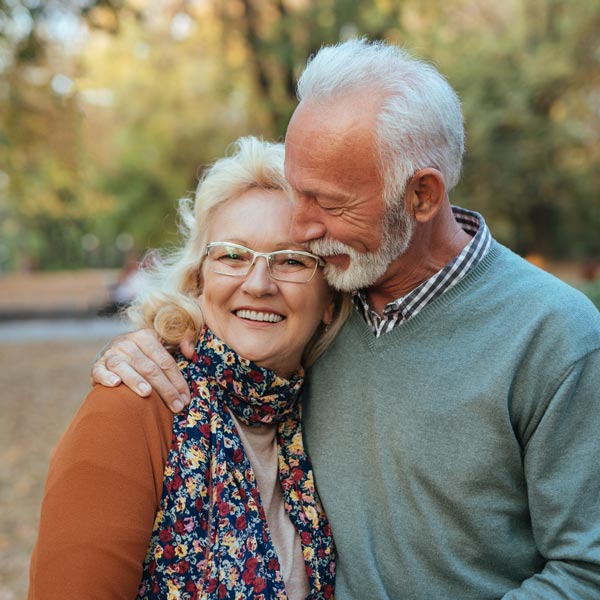 senior couple hugging