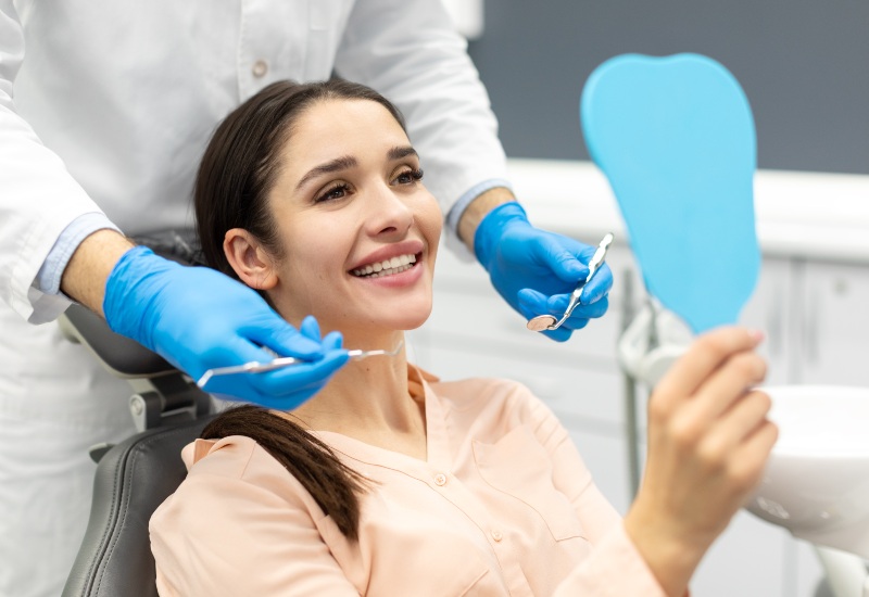 Smiling patient after dental cleaning in Plainfield, IN