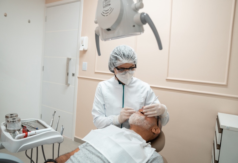Experienced senior dentist providing dental care at a trusted clinic in Plainfield, IN
